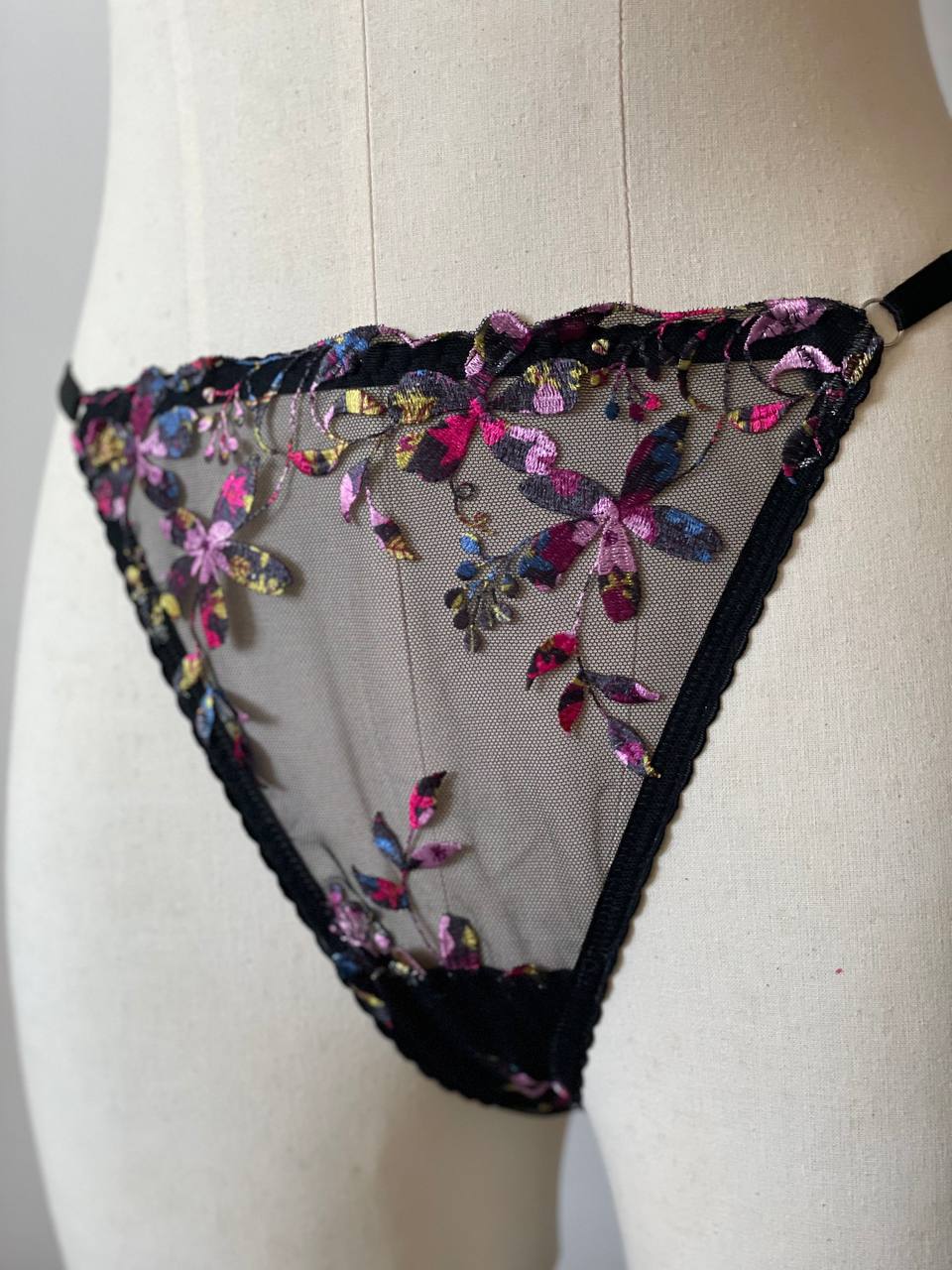 Vibrant embroidered lace thongs